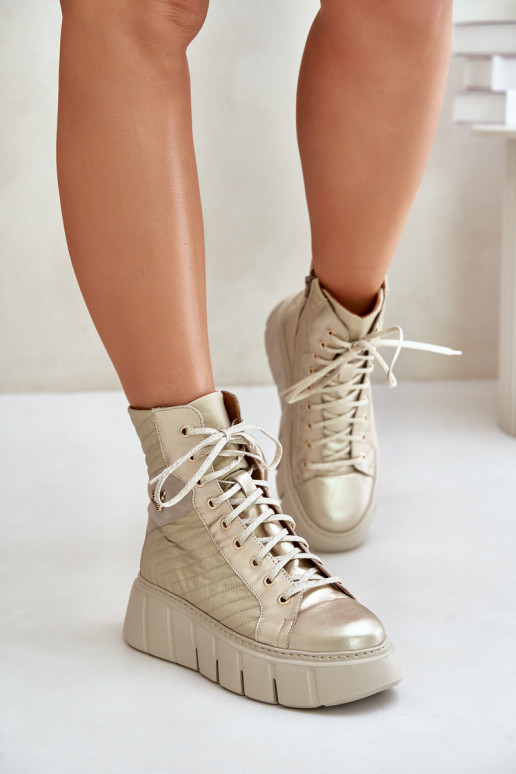 Haut Stiefel mit einer Plattform Es mussciejka 06751-25 goldene Farbe