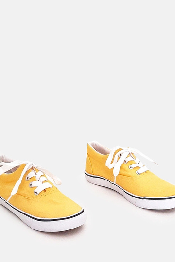 Gelbe Kindersportschuhe mit Schnürsenkeln Bollis