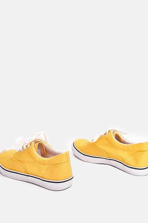 Gelbe Kindersportschuhe mit...