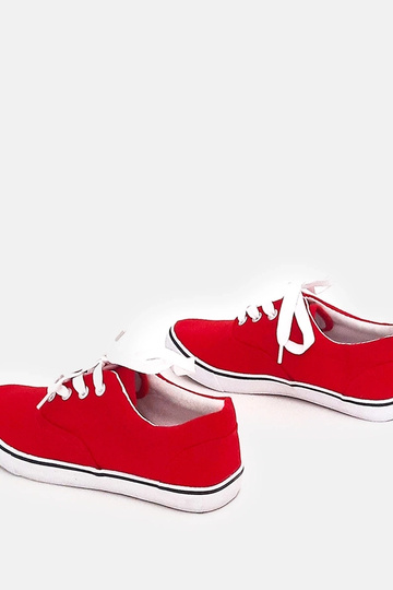 Rote Kindersportschuhe mit...