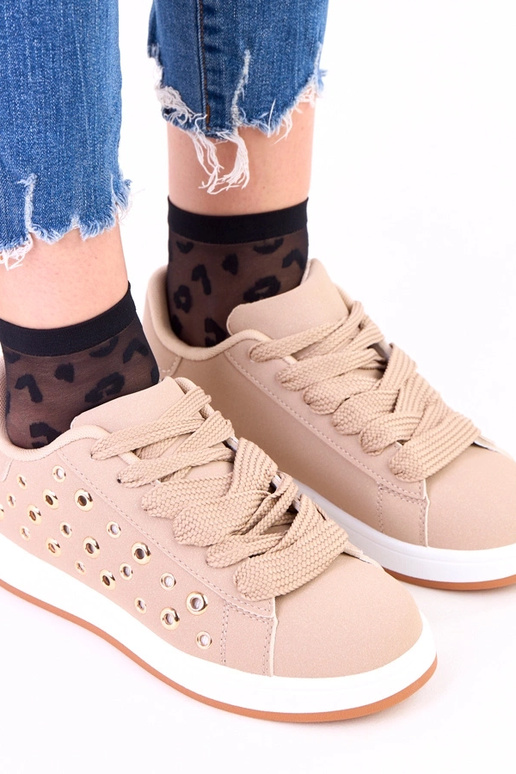 Braune Sneakers auf Plattform mit...