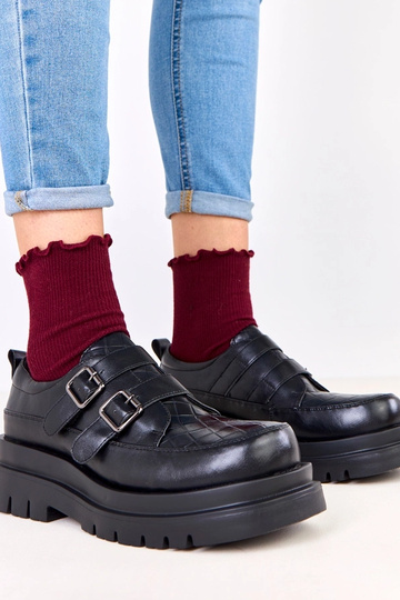 Schwarze Halbstiefel auf...