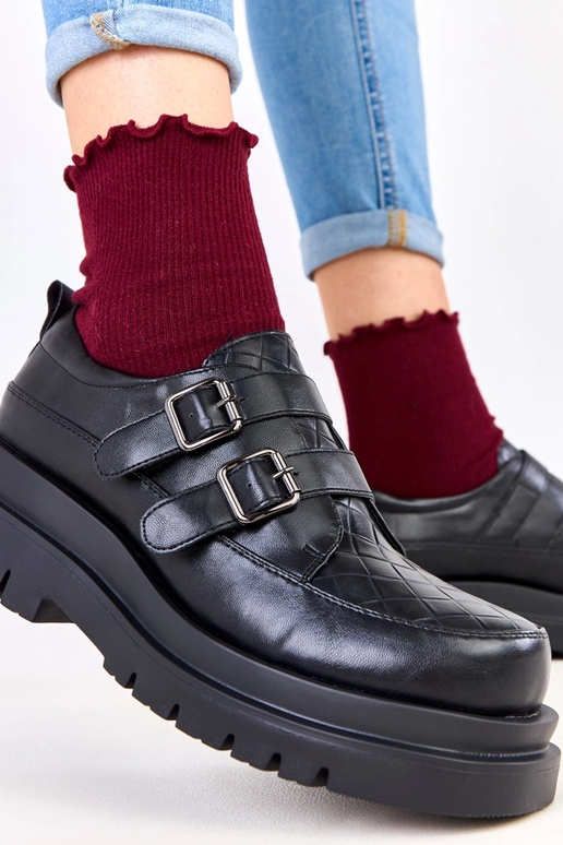 Schwarze Halbstiefel auf massiver...