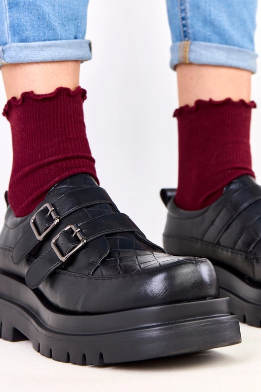 Schwarze Halbstiefel auf massiver...