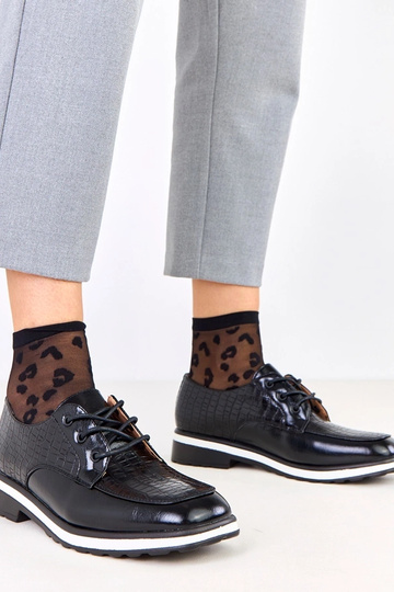 Schwarze Halbschuhe mit...