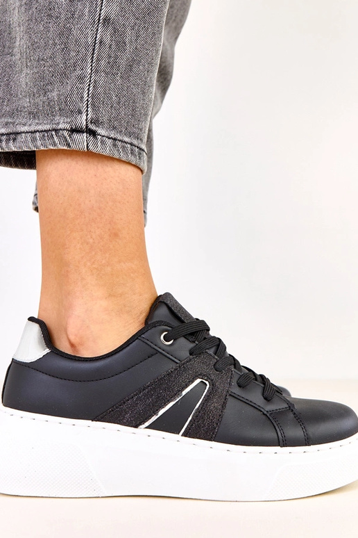Schwarze Sneakers mit Plattform und...