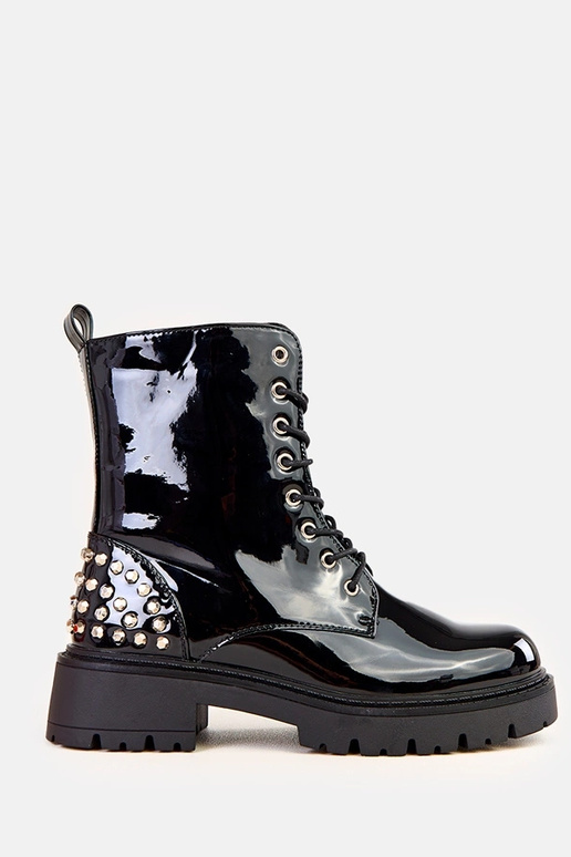 Schwarze lackierte Stiefel mit... Schwarze lackierte Stiefel mit...