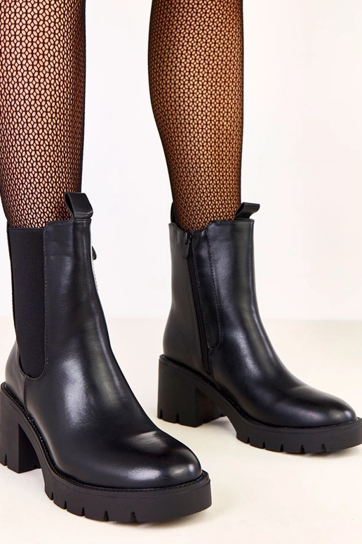 Schwarze Ankle Boots mit...