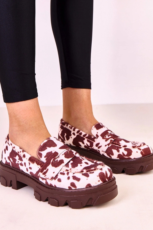 Braune Damenmokassins mit Kuhflecken...