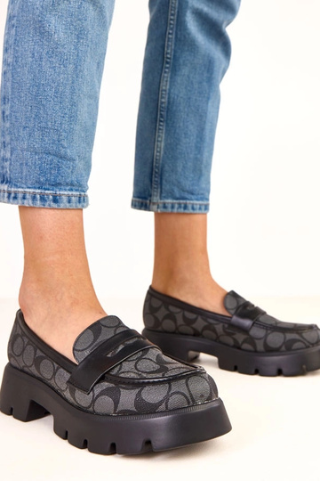 Schwarze Mokassins mit...