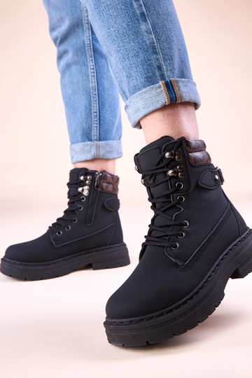 Schwarze warme Trapper aus...