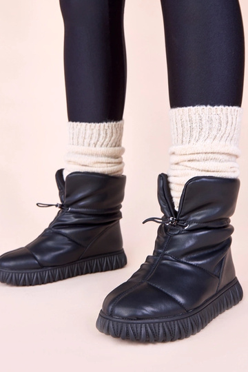 Schwarze Schneestiefel aus...