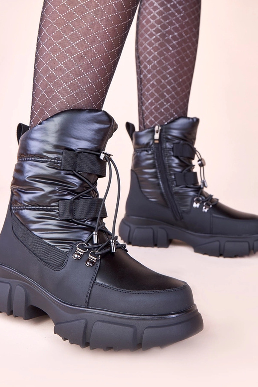 Schwarze glänzende Schneestiefel mit...