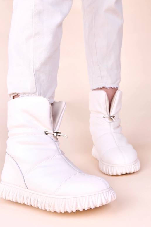 Beige Schneestiefel aus Naturleder...