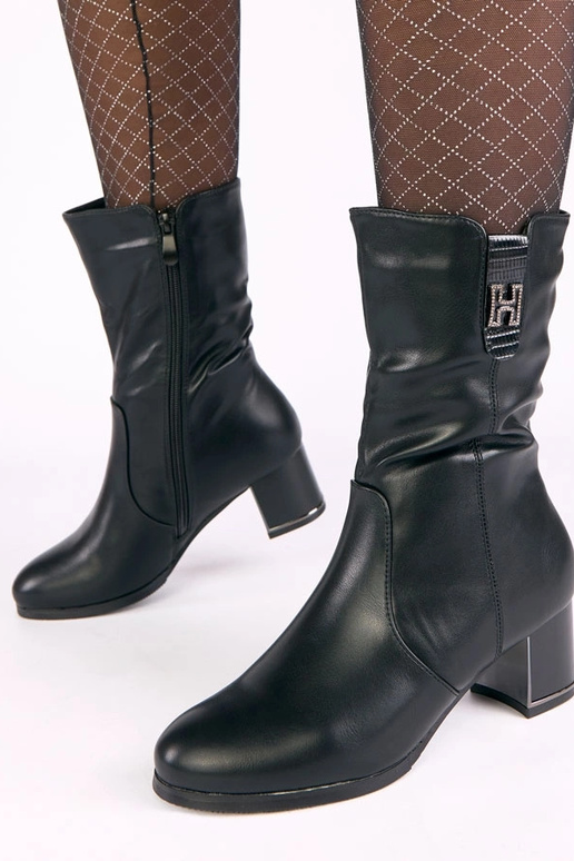 Schwarze beheizbare Stiefeletten auf...