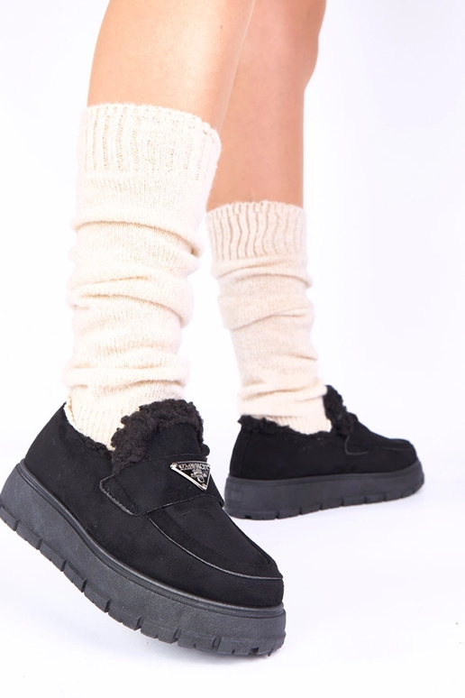 Schwarze Plateauschuhe mit Fell Kirby