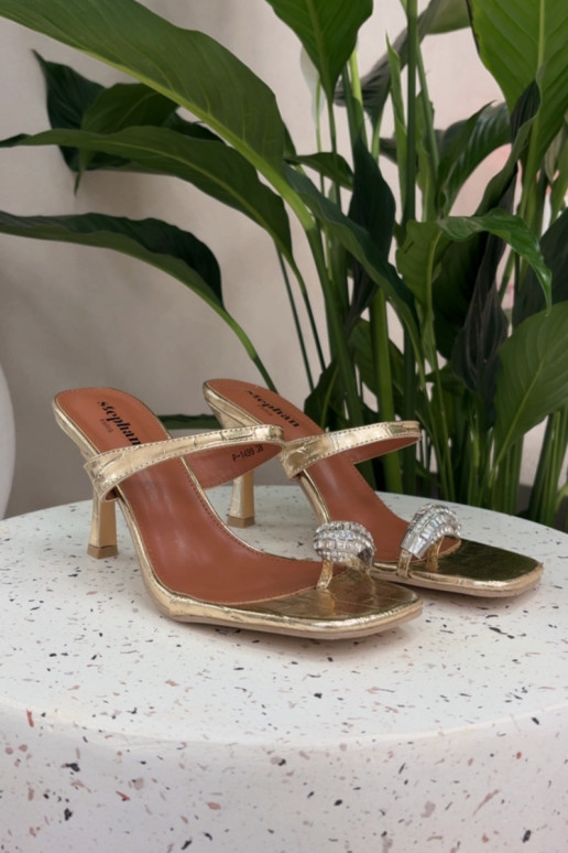 Damen goldene Pantoletten mit dünnen Absätzen und eleganten Details Lorissa