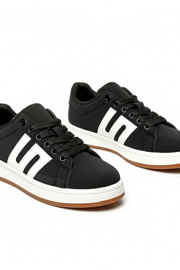 Schwarze Alltagssneaker... 2