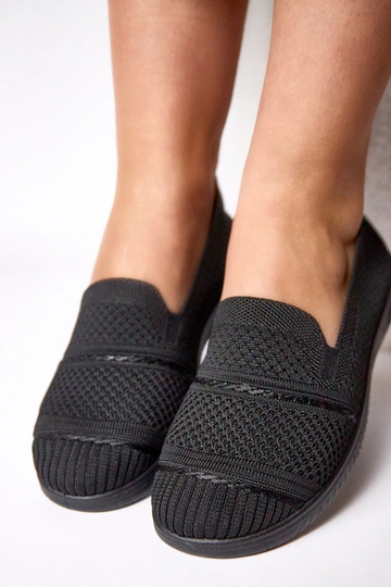 Schwarze Slip-On... 2