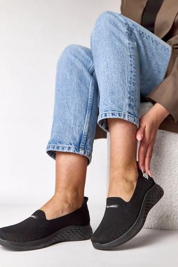 Schwarze textile Slip-On... 2