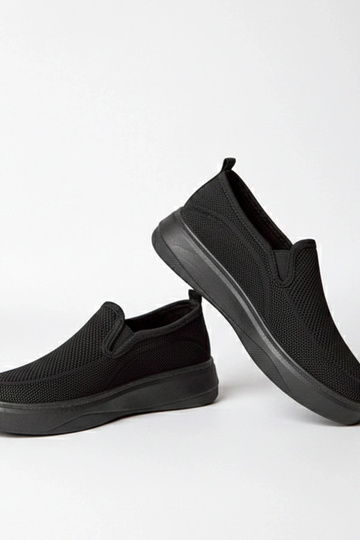 Schwarze textile Sport-Sneaker auf Plattform Céleste