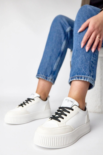 Schwarz-weiße Sport-Sneaker auf Plattform Solange