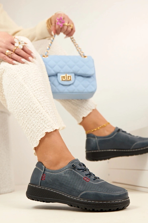 Dunkelblaue Lochmuster Halbschuhe...