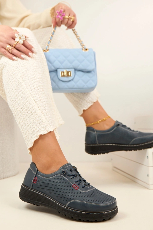 Dunkelblaue Lochmuster Halbschuhe...