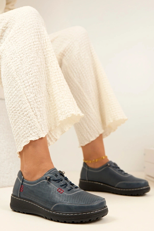 Dunkelblaue Lochmuster Halbschuhe...