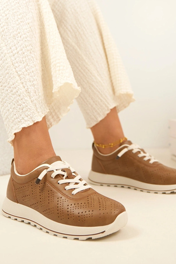 Hellbraune durchbrochene...