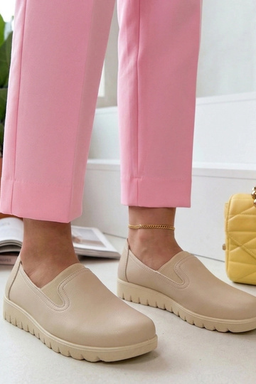 Sandfarbene Halbschuhe mit...