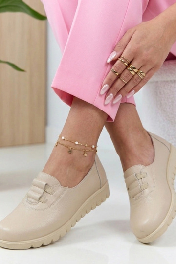 Sandfarbene Halbschuhe mit...