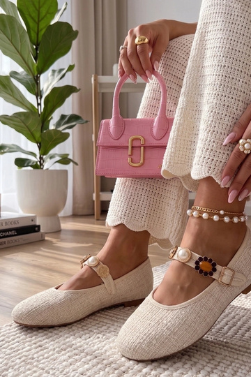 Sandfarbene Ballerinas mit...