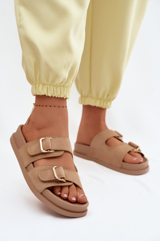 Beige Slipper mit goldenen Schnallen Pelorin