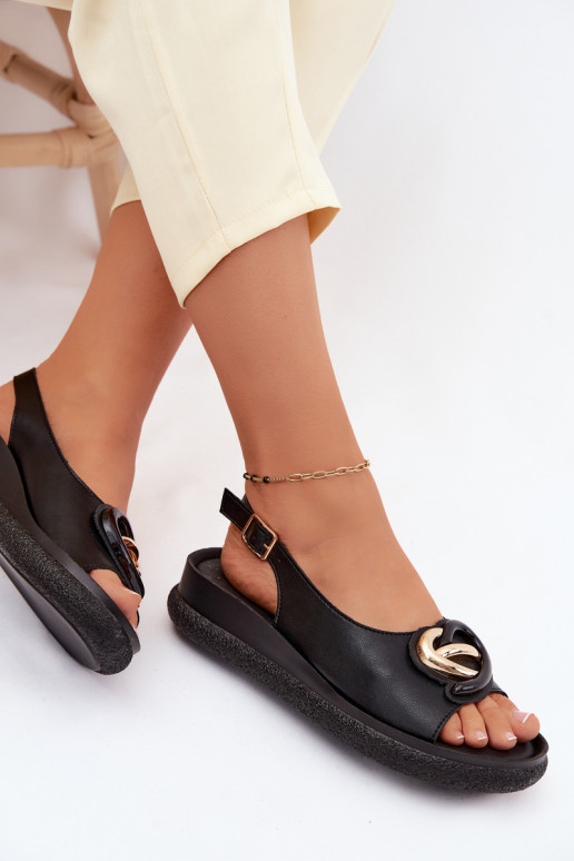 Lederne Plattform-Sandalen mit Ornamenten in Schwarz