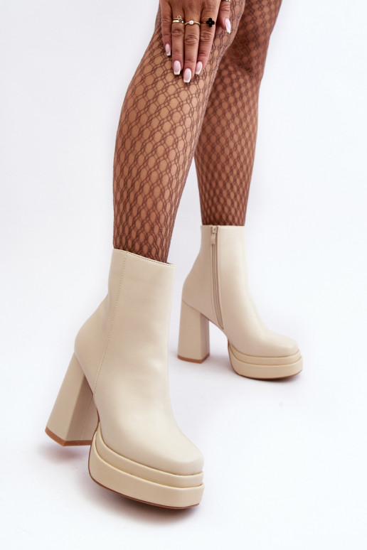 Elfenbeinfarbene Stiefeletten mit Plattform Sandstra
