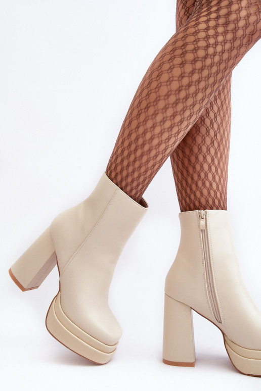 Elfenbeinfarbene Stiefeletten mit Plattform Sandstra