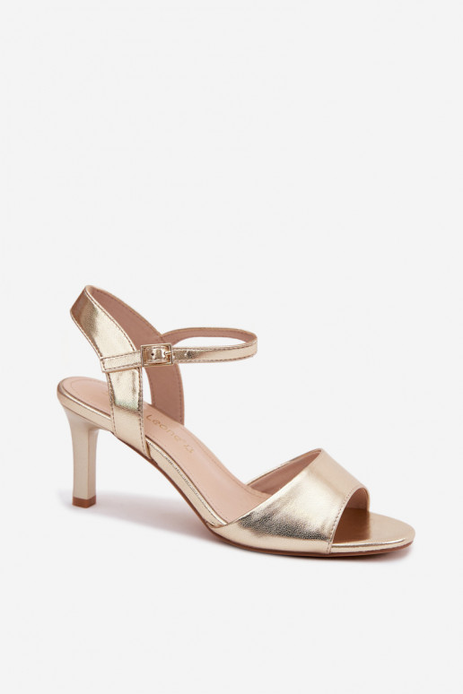 Damen Sandalen auf einem dünnen Absatz in goldfarben von Sergio Leone