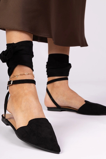 Schwarze Mules mit flachem Absatz Mella