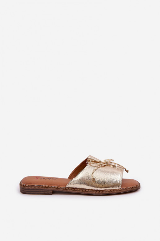Goldene flache Slipper mit dekorativem Bogen Deonelis