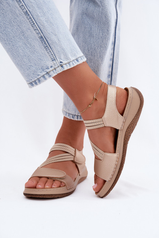Goldene Damen-Sandalen mit elastischen Riemen
