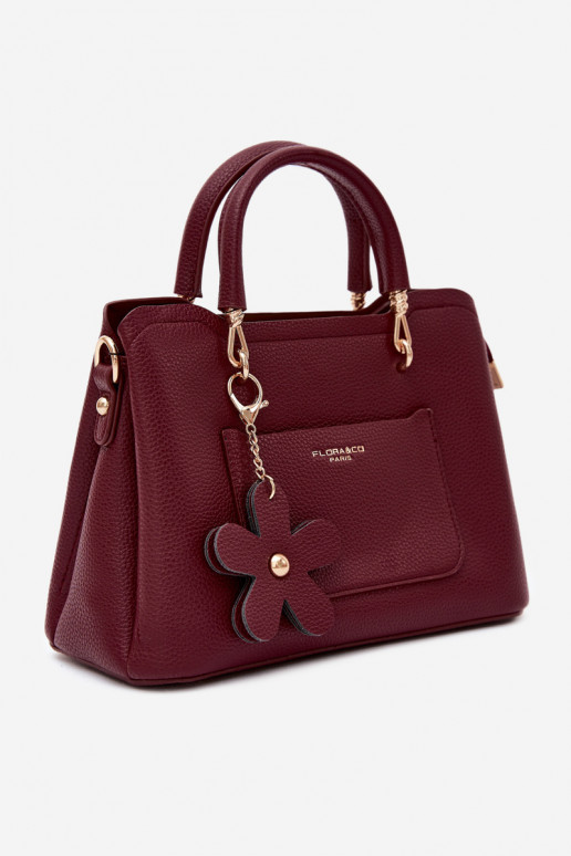 Handtasche mit Kunstleder-Schlüsselanhänger mit Blumenmotiven in bordeaux Noomi
