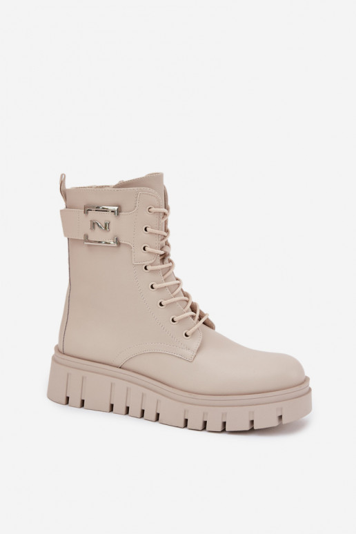 Wärmende Stiefeletten mit Plattform und dekorativen Details in Elfenbein Lyrana