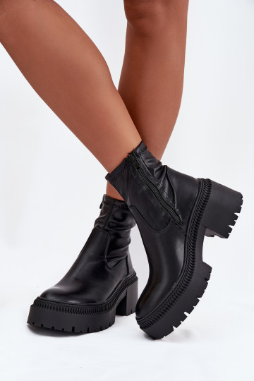 Damen Stiefeletten auf massiven Absätzen und Plattform aus schwarzem Kunstleder Elvianne