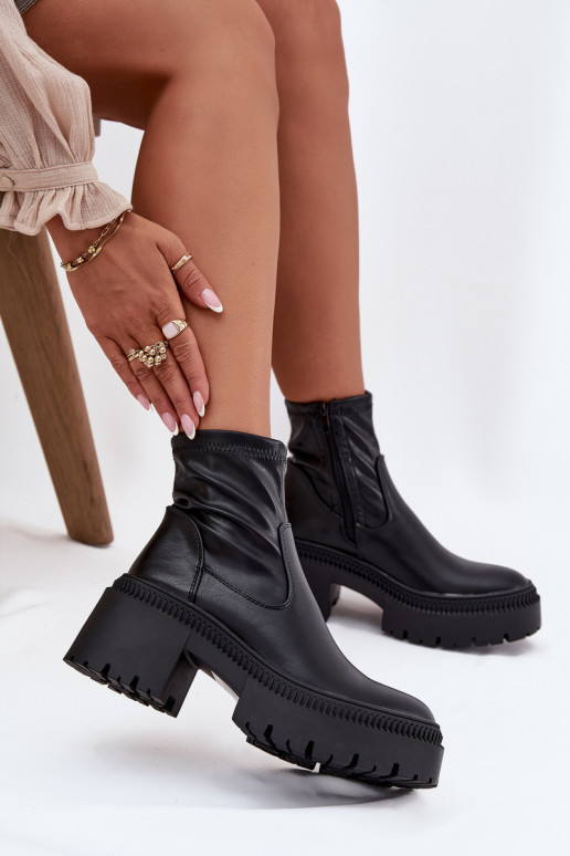 Damen Stiefeletten auf massiven Absätzen und Plattform aus schwarzem Kunstleder Elvianne