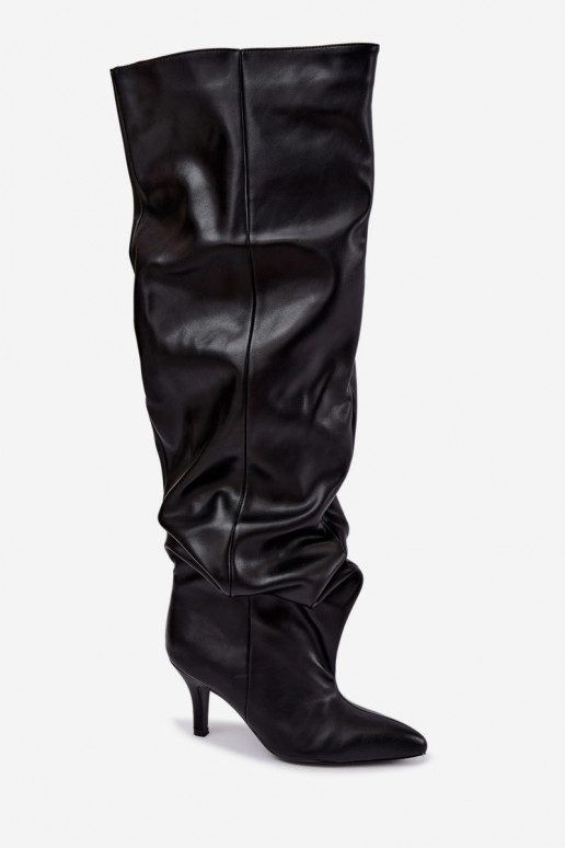 kniehohe Stiefeletten zum Hineinschlüpfen mit Absatz in schwarz Calmy