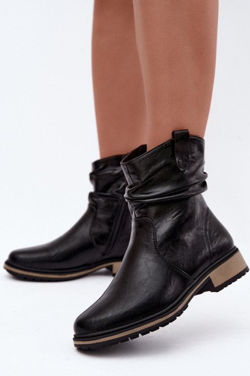 Wärmende Damen-Stiefeletten mit Falten in Schwarz