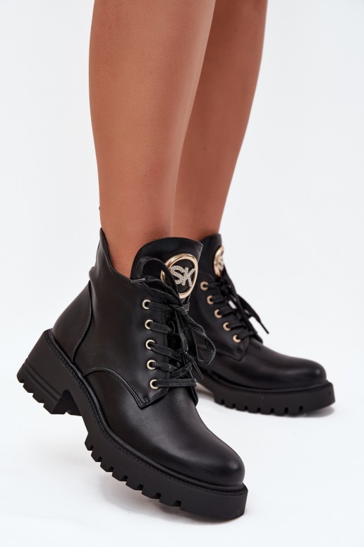 Isolierte Damen-Stiefeletten mit goldenen Details in Schwarz Kavirae