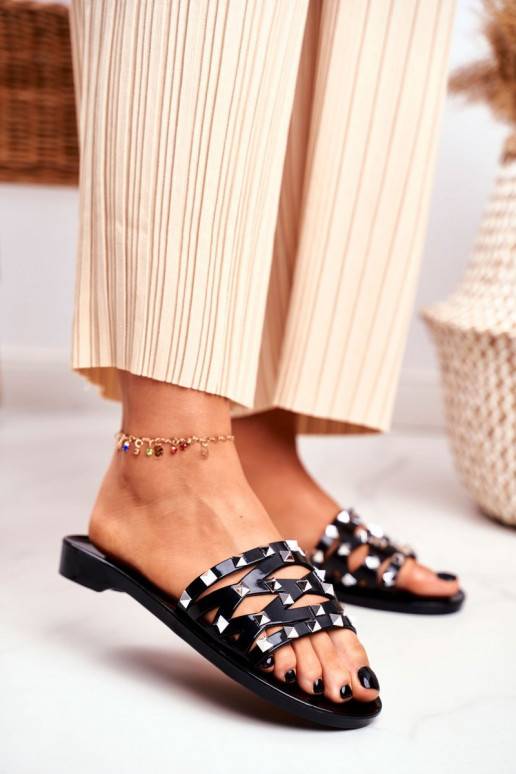 Schwarze Gummipantoffeln mit Nieten Schwarze Gummipantoffeln mit Nieten