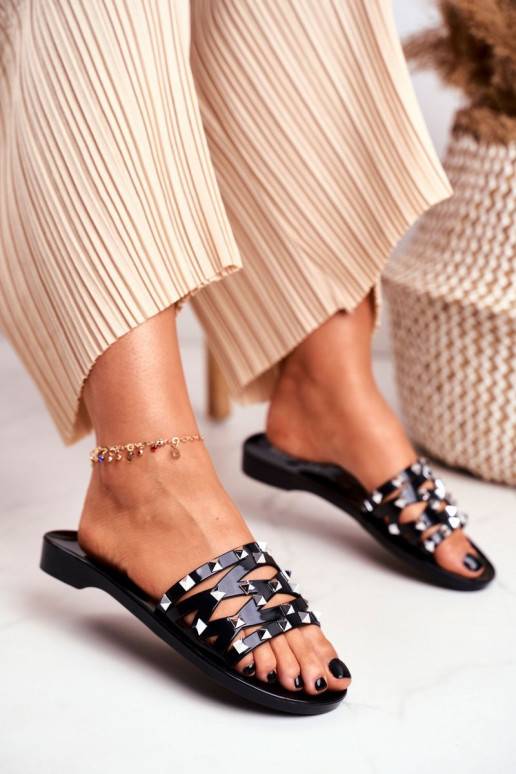 Schwarze Gummipantoffeln mit Nieten Schwarze Gummipantoffeln mit Nieten